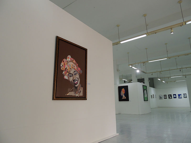 In the foreground: the portrait of Aminata TOURE - in the background: Coumba GAWLO SECK and El Hadj Malick SY